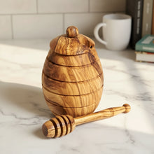 Small handmade olive wood honey jar with dipper