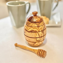 Small handmade olive wood honey jar with dipper