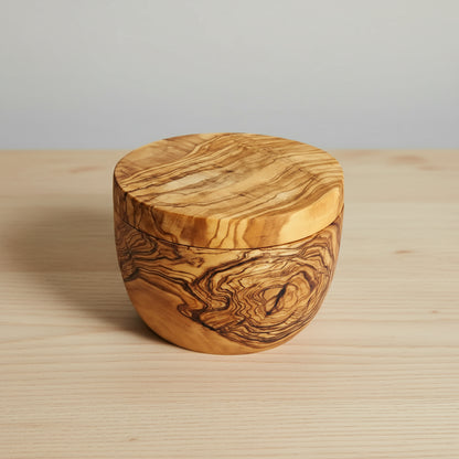 Handmade Olive Wood Salt Cellar with Swivel Lid showing a round bowl with grain patterns