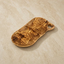 Handmade olive wood tray with handle featuring natural swirling grain and polished finish for serving favorite snacks