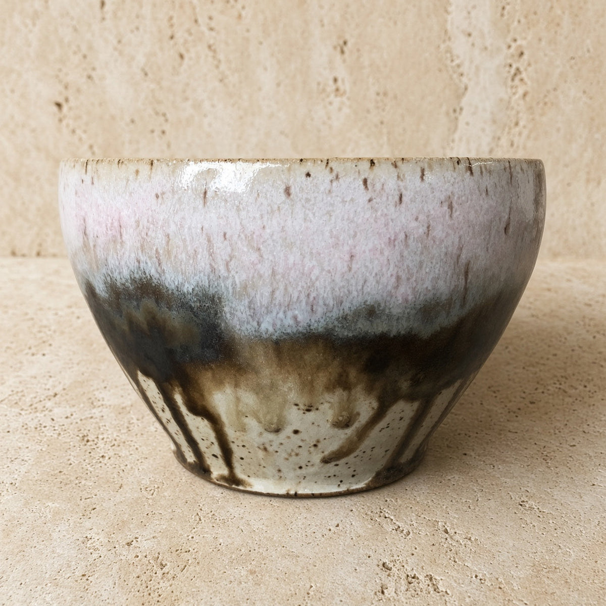 Handmade pottery soup bowl with unique borealis glaze in white gray and dark brown drips for organic appeal