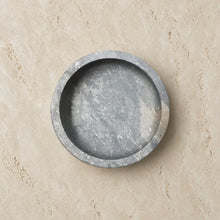 Handmade shallow soapstone bowl with gray stone ashtray, smooth textured surface, rounded edges, perfect for treasures deserve