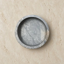 Handmade shallow soapstone bowl with gray stone ashtray, smooth textured surface, rounded edges, perfect for treasures deserve