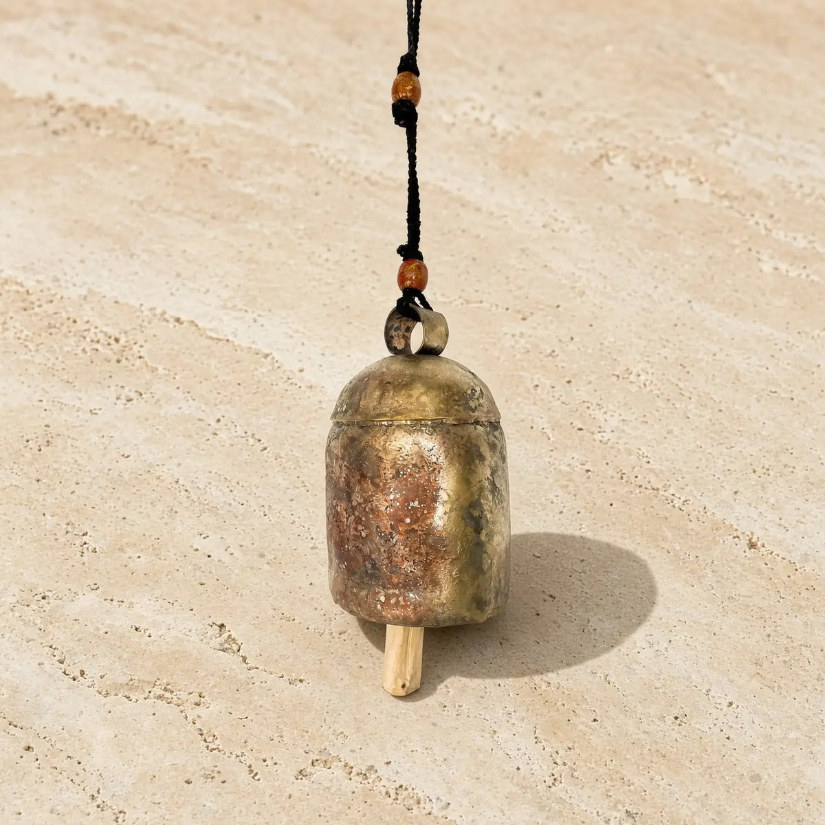 Handmade solo copper large copper zen bell with an antique patina and wooden bead accents on a black cord
