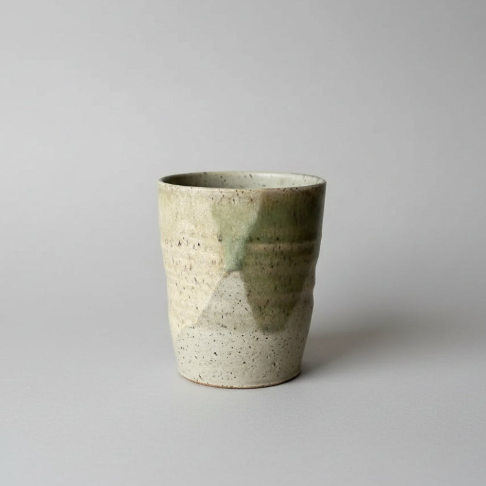 Handmade eco-friendly ceramic mug with speckled base and green glaze color combo