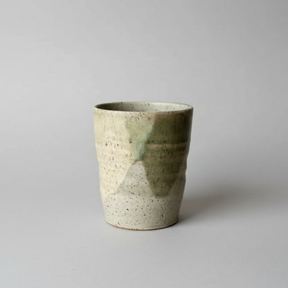 Handmade eco-friendly ceramic mug with speckled base and green glaze color combo