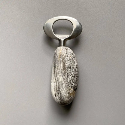 Handmade stainless steel bottle opener with natural stone finish and brushed metal accents