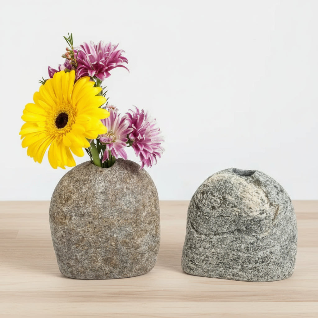 Handmade eco-friendly stone vase with yellow and purple dried flowers for home decor