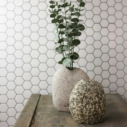Handmade speckled stone vase with green plant, eco-friendly decor for your space