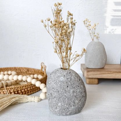 Handmade stone vase with dried flowers, eco-friendly minimalist decor piece