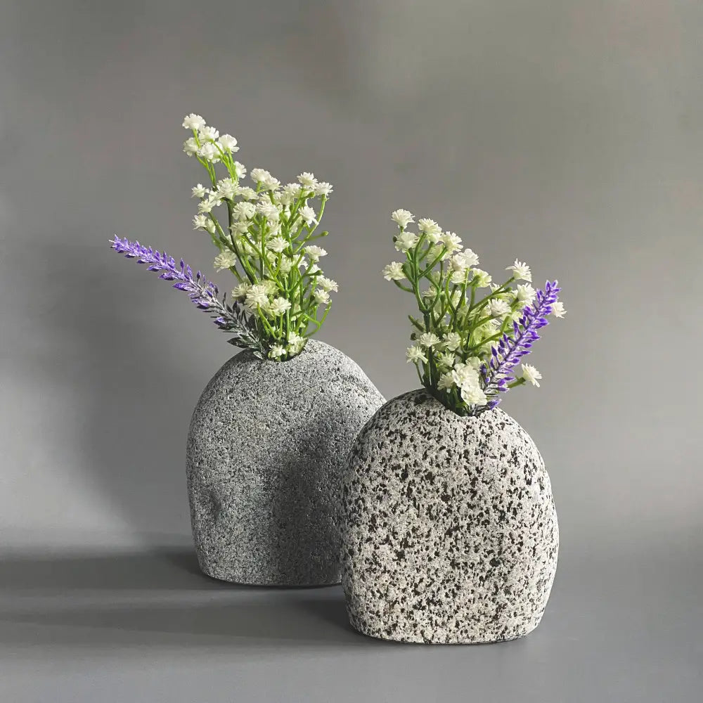Handmade stone vase with lavender and white flowers for eco-friendly decor