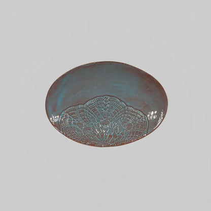 Stunning handmade oval platter with lace pattern in teal glaze