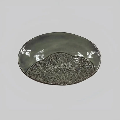 Gray handmade stoneware oval platter with stunning lace pattern
