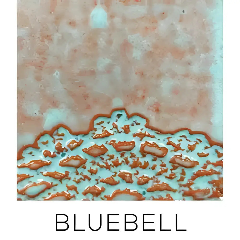 Handmade white ceramic serving platter with embossed lace pattern and bluebell tile textured turquoise rust glaze