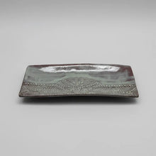 Handmade stoneware platter with embossed lace pattern in gray glaze