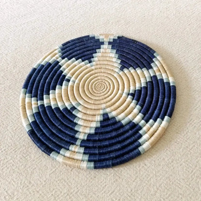 Handwoven african sisal trivet with circular navy blue beige and light gray rings perfect sisal trivet for decor