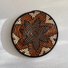 Handwoven african zulu trivet with taupe brown star made of ilala palm and wild grasses from south africa