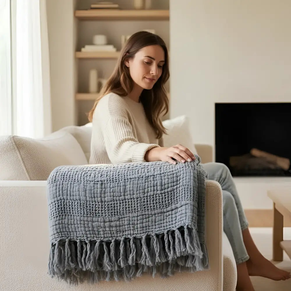 Blue handwoven cotton waffle throw blanket with fringed edges
