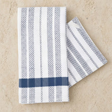 White and navy blue striped hache weave towel with woven diamond pattern from guatemala’s western highlands women’s cooperative