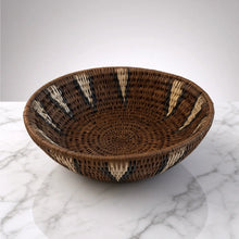 Handwoven large african zulu bowl in south africa with cream and black geometric patterns made from sustainably sourced ilala palm