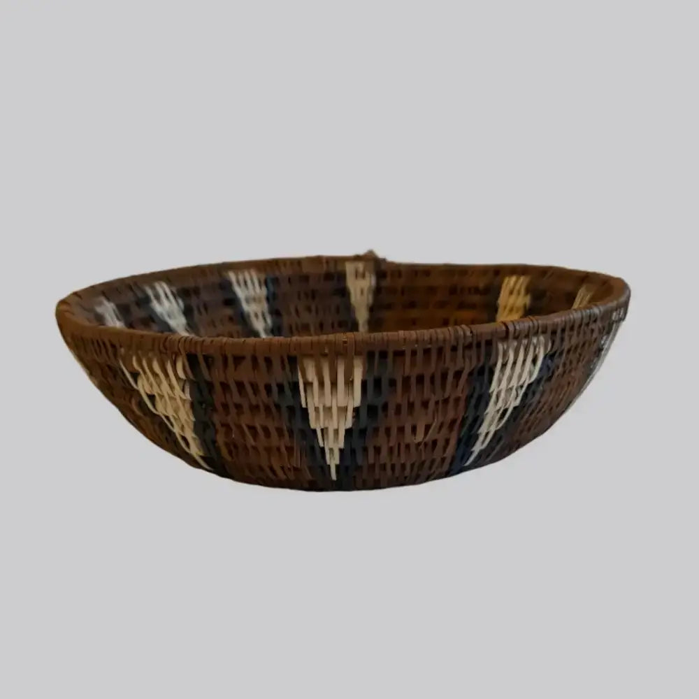 Handwoven large african zulu bowl with brown cream and dark accents made from sustainably sourced ilala palm south africa