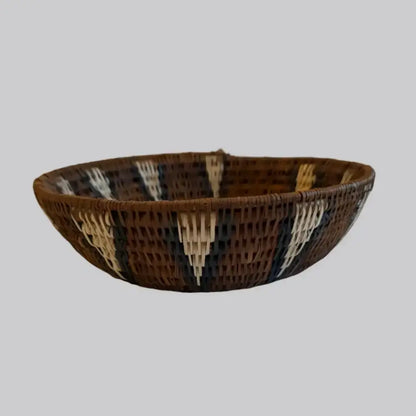 Handwoven large african zulu bowl with brown cream and dark accents made from sustainably sourced ilala palm south africa