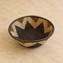 Handwoven large african zulu bowl with black beige tan geometric pattern made from sustainably sourced ilala palm south africa
