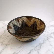 Handwoven large african zulu bowl with geometric pattern in brown beige and black made from sustainably sourced ilala palm south africa