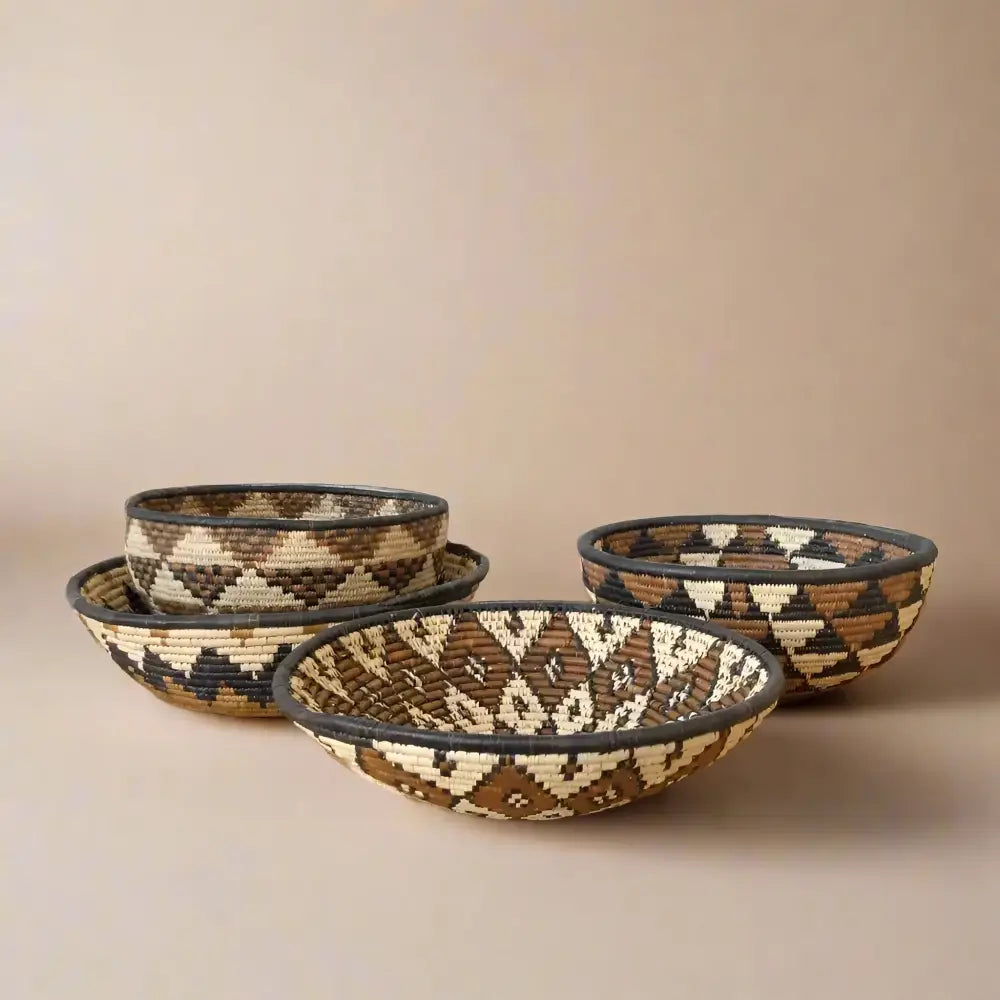 Handwoven large african zulu bowl with subtle star pattern in natural brown cream and dark accents sustainably sourced from south africa