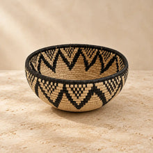 Handwoven large african zulu bowl with natural beige and black zigzag pattern made from sustainably sourced ilala palm from south africa