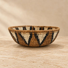Handwoven medium african zulu bowl with geometric pattern in natural brown black and cream made from ilala palm and wild grasses