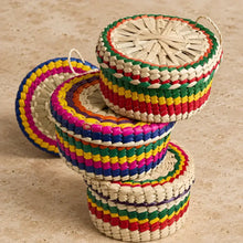 Colorful handwoven mexican palm tortilla basket with rainbow stripes and natural handles perfect for taco night warm tortillas