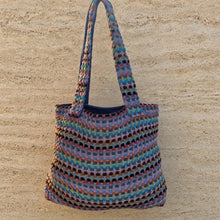 Handwoven tote bag made of turkish cotton in blue pink orange and black with a large multicolor tote design