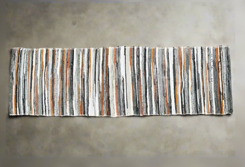 Colorful handwoven upcycled fabric table runner with multi-colored stripes