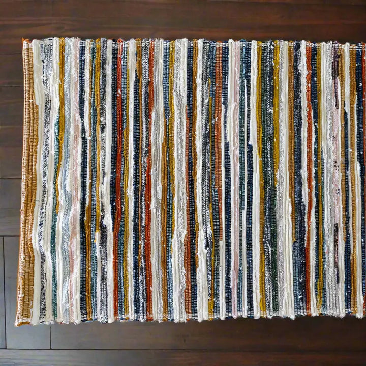 Colorful handwoven upcycled fabric table runner with striped rag rug design