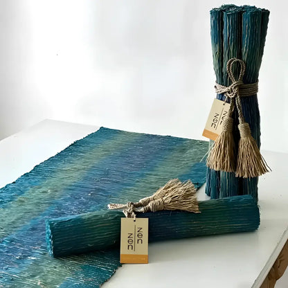 Teal and green gradient vetiver placemat with textured surface tied with natural jute rope and tassels from set of 6
