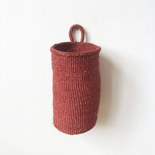 Woven oblong hanging basket made from sisal with one hanging loop.