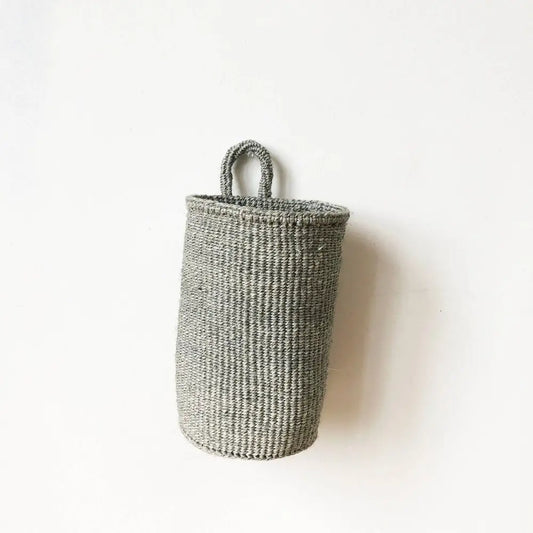 Woven oblong hanging basket made from sisal with one hanging loop.