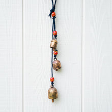 Handmade harmony bells with copper bells, red orange beads on black rope
