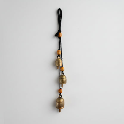 Handmade harmony bells with brass trio, orange beads on black rope