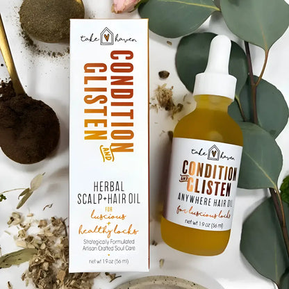 Take haven condition and clisten herbal hair oil in a clear glass bottle with white dropper cap and golden-yellow lightweight essential oils