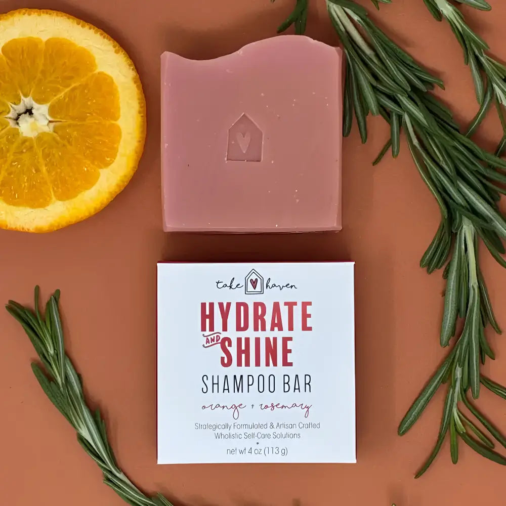 A pink herbal shampoo bar with a house-shaped embossment packed with nourishing organic oils to provide dandruff relief