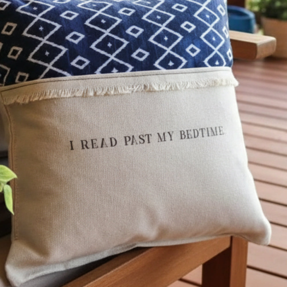 Navy geometric reading pillow with I read past my bedtime text
