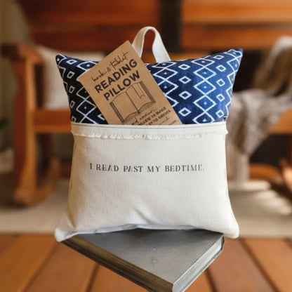 Cream reading pillow with navy geometric pattern and read past my bedtime print