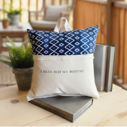 Navy geometric reading pillow with I read past my bedtime text