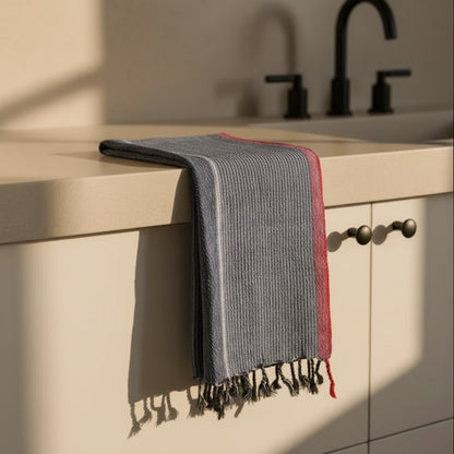 Indigo Tribeca handmade hand towel with blue and red striped design and tassels