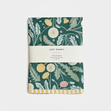 Green floral print Just Dandy Towel with yellow stripes