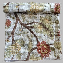 Traditional Indian kantha quilt with block print tree design.