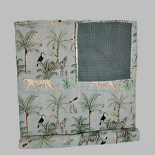 Tradional Indian Kantha quilt with block printed jungle design.