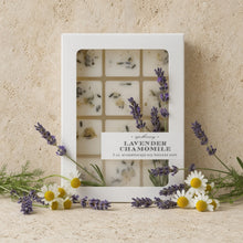 A white box of lavender chamomile wax melts made from natural soy-beeswax blend with dried herbs and fresh flowers